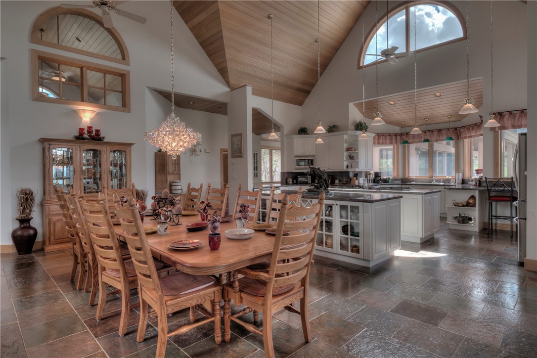 1996 Rodeo Drive Silverthorne, CO 80498 - Photo 19 of 35 a view of a dining room with furniture and wooden floor