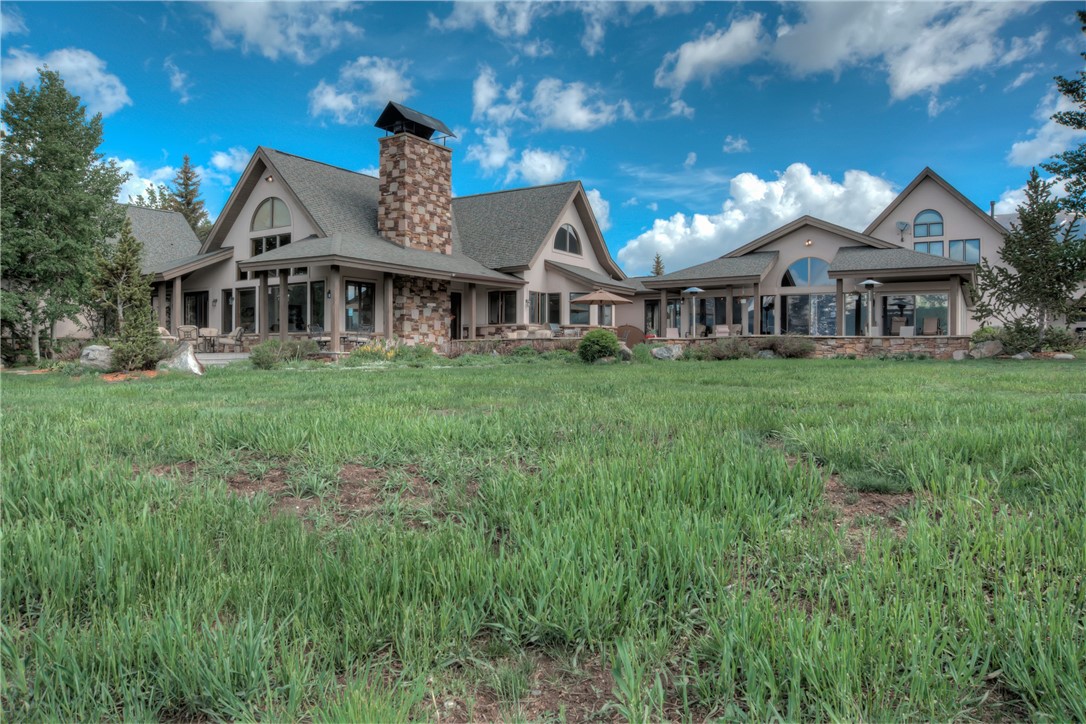 1996 Rodeo Drive Silverthorne, CO 80498 - Photo 2 of 35 a front view of a house with a garden