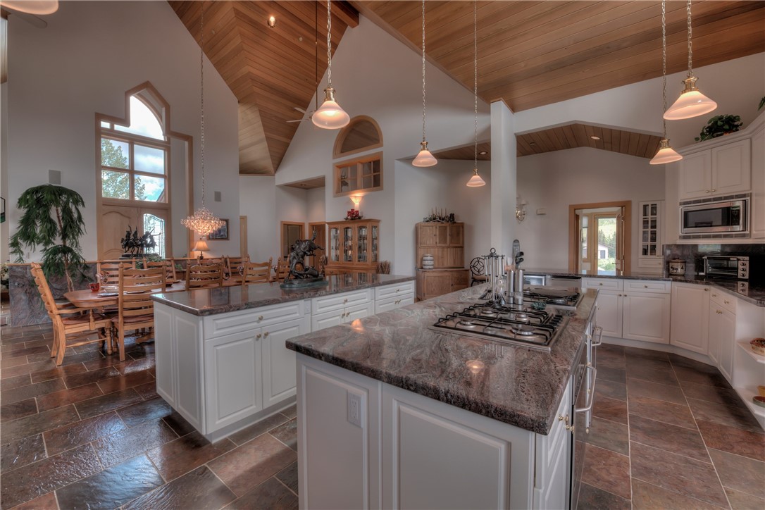 1996 Rodeo Drive Silverthorne, CO 80498 - Photo 21 of 35 a kitchen with stainless steel appliances granite countertop a sink a stove and cabinets