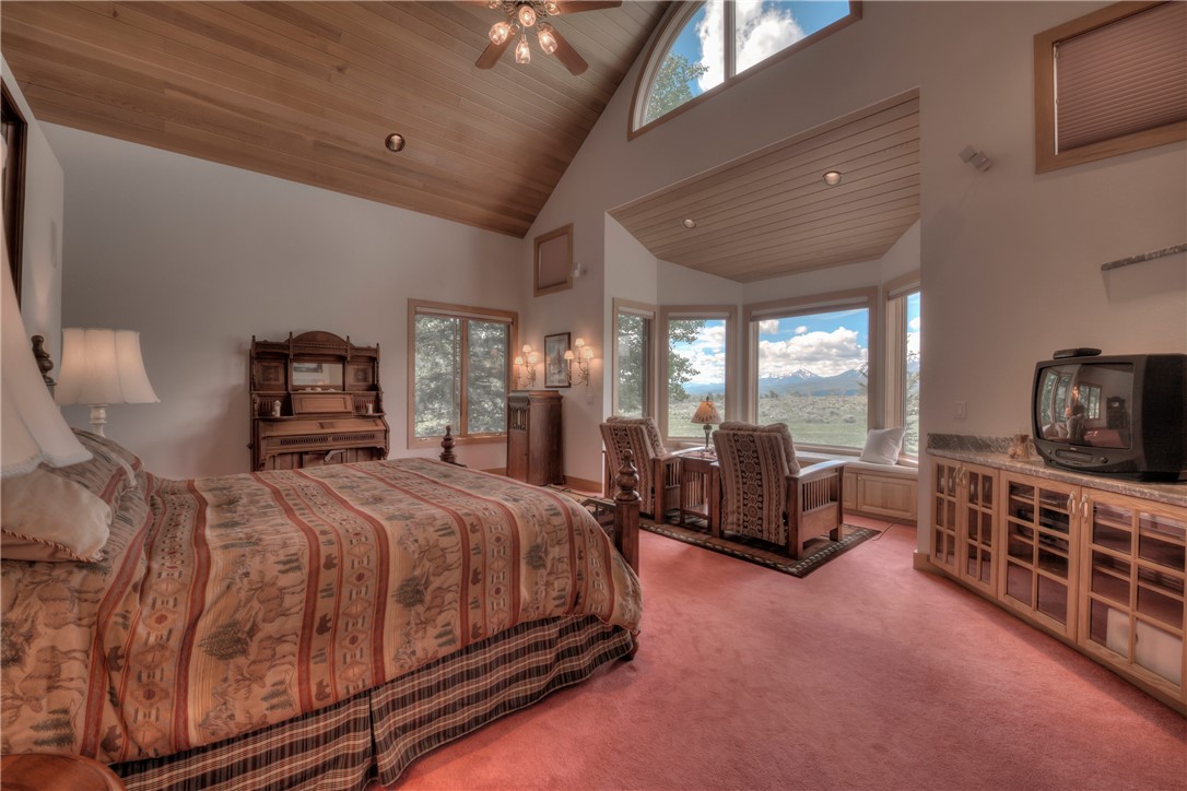 1996 Rodeo Drive Silverthorne, CO 80498 - Photo 24 of 35 a bedroom with a bed a couch and dresser