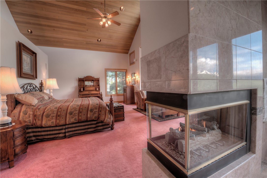 1996 Rodeo Drive Silverthorne, CO 80498 - Photo 25 of 35 a bedroom with bed and balcony