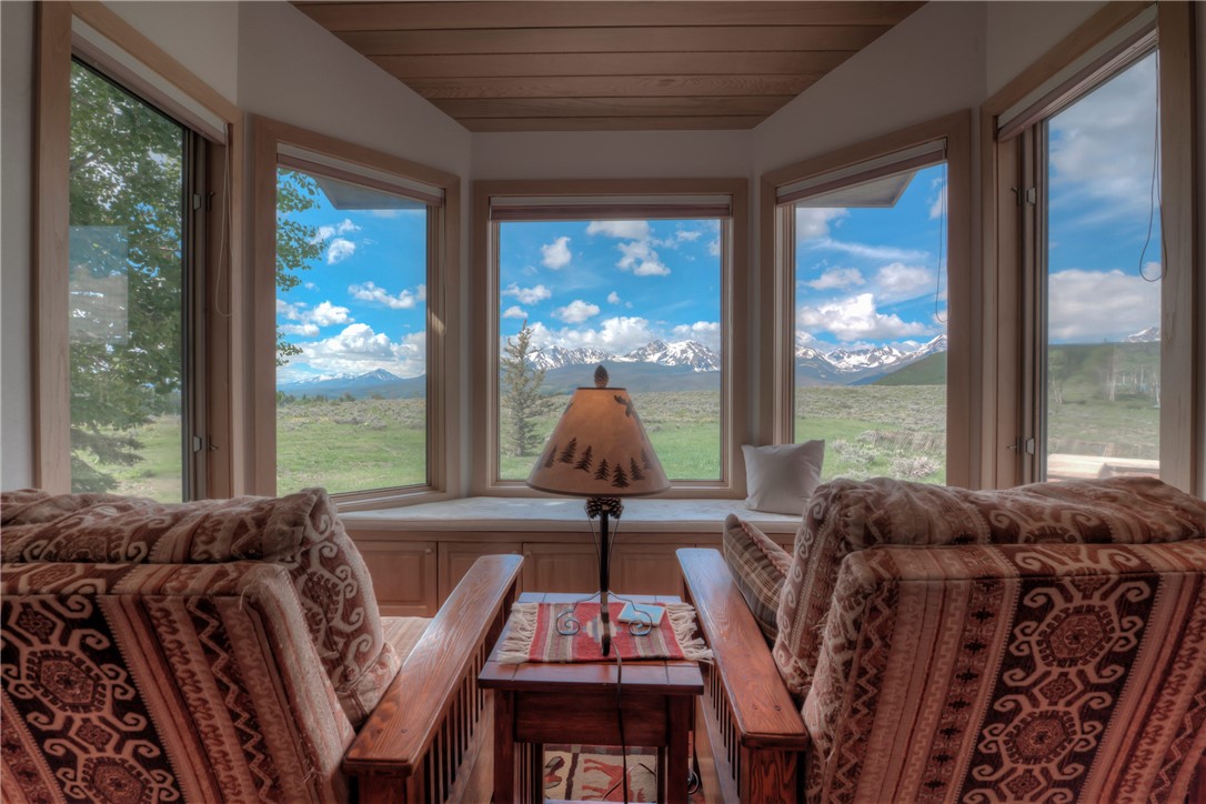 1996 Rodeo Drive Silverthorne, CO 80498 - Photo 26 of 35 a living room with furniture and large windows