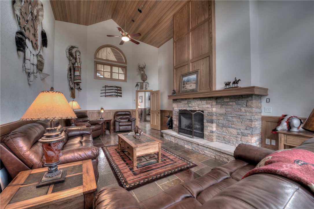 1996 Rodeo Drive Silverthorne, CO 80498 - Photo 33 of 35 a living room with furniture and a fireplace