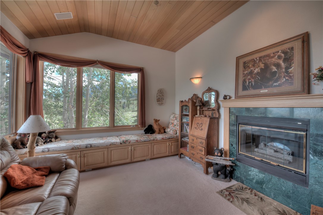1996 Rodeo Drive Silverthorne, CO 80498 - Photo 35 of 35 a living room with furniture and a fireplace