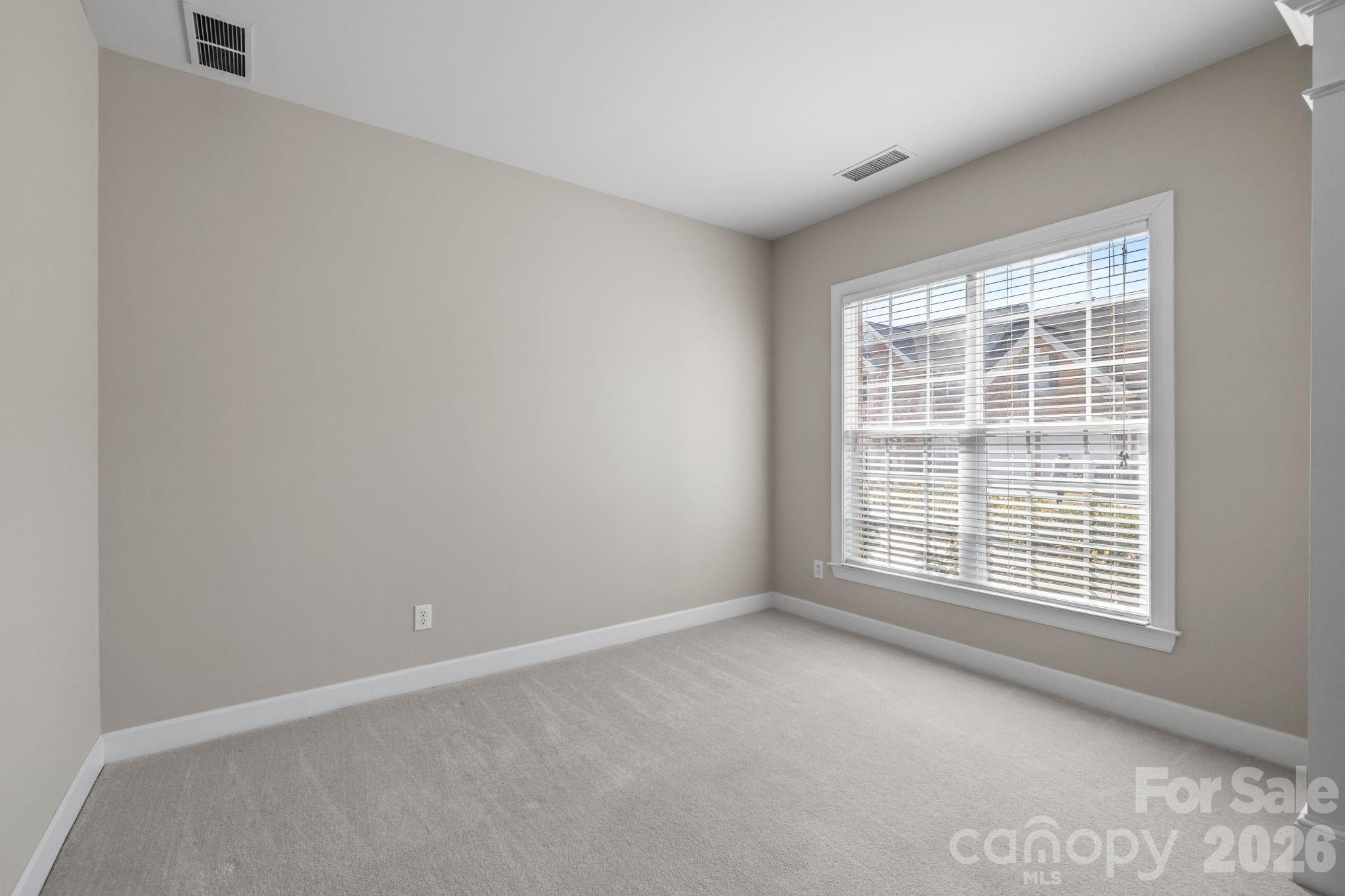 412 Eberle Way Matthews, NC 28105 - Photo 11 of 43 an empty room with a window