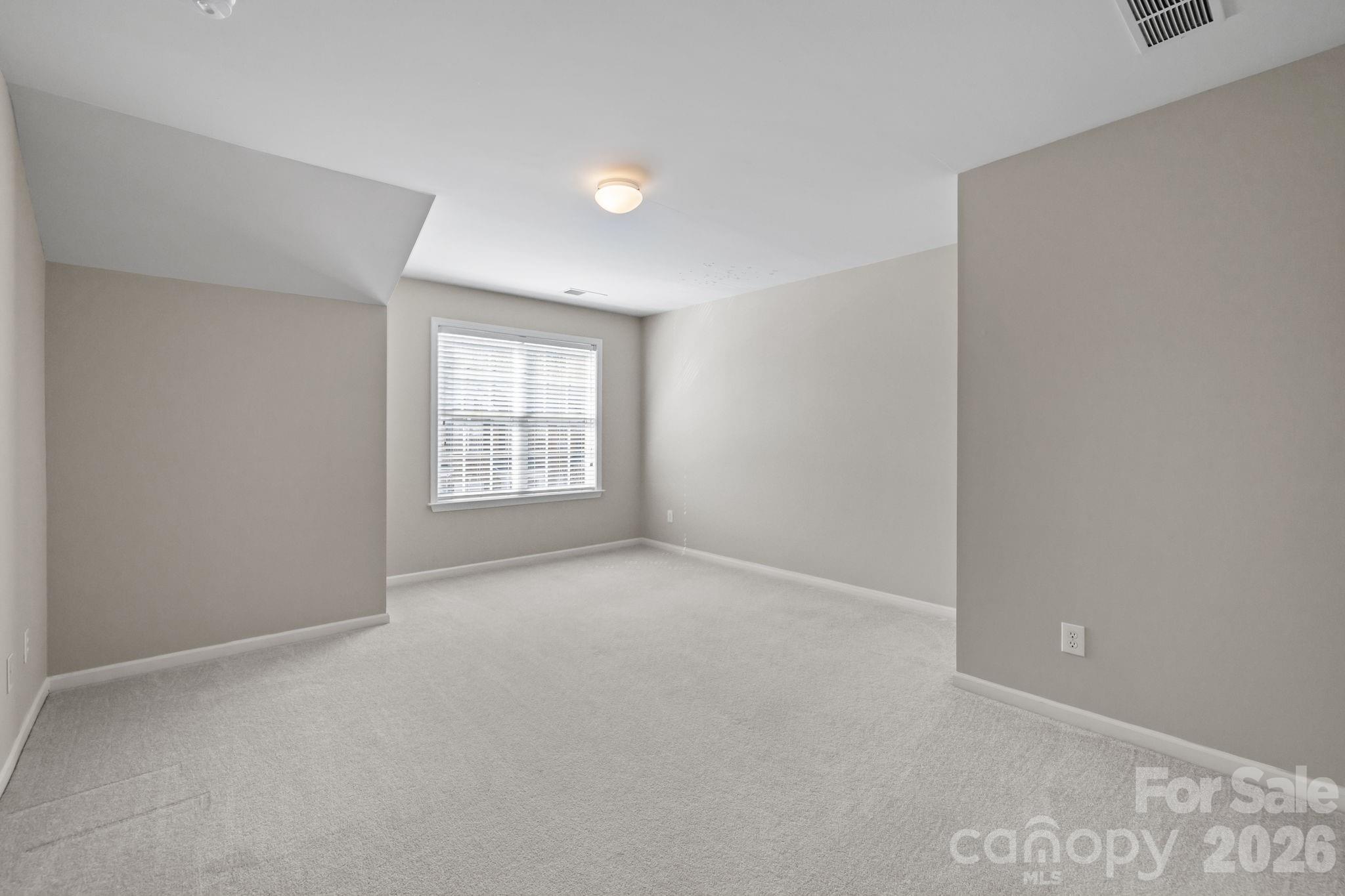 412 Eberle Way Matthews, NC 28105 - Photo 31 of 43 a view of an empty room with a window