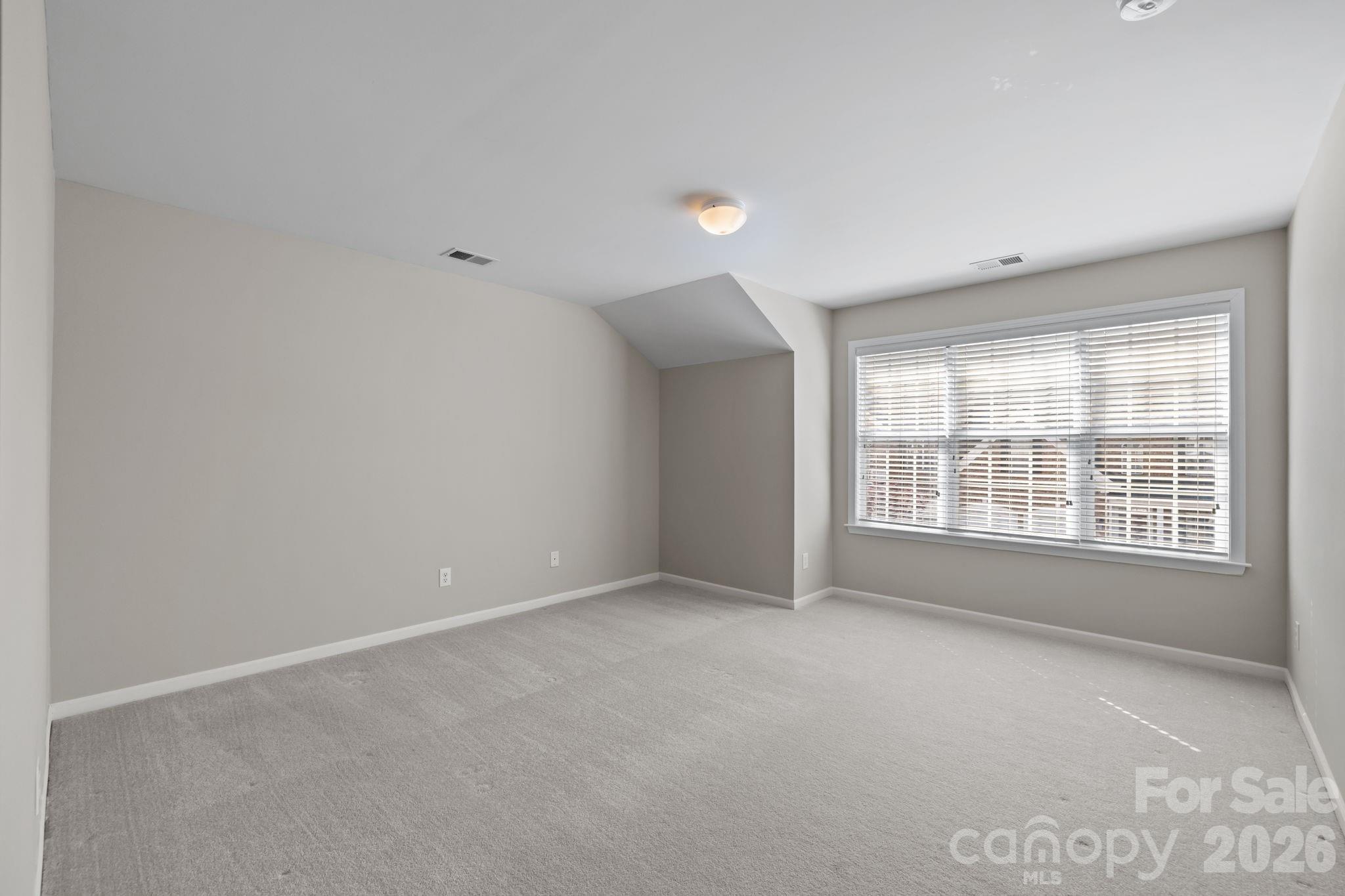 412 Eberle Way Matthews, NC 28105 - Photo 32 of 43 a view of an empty room with a window
