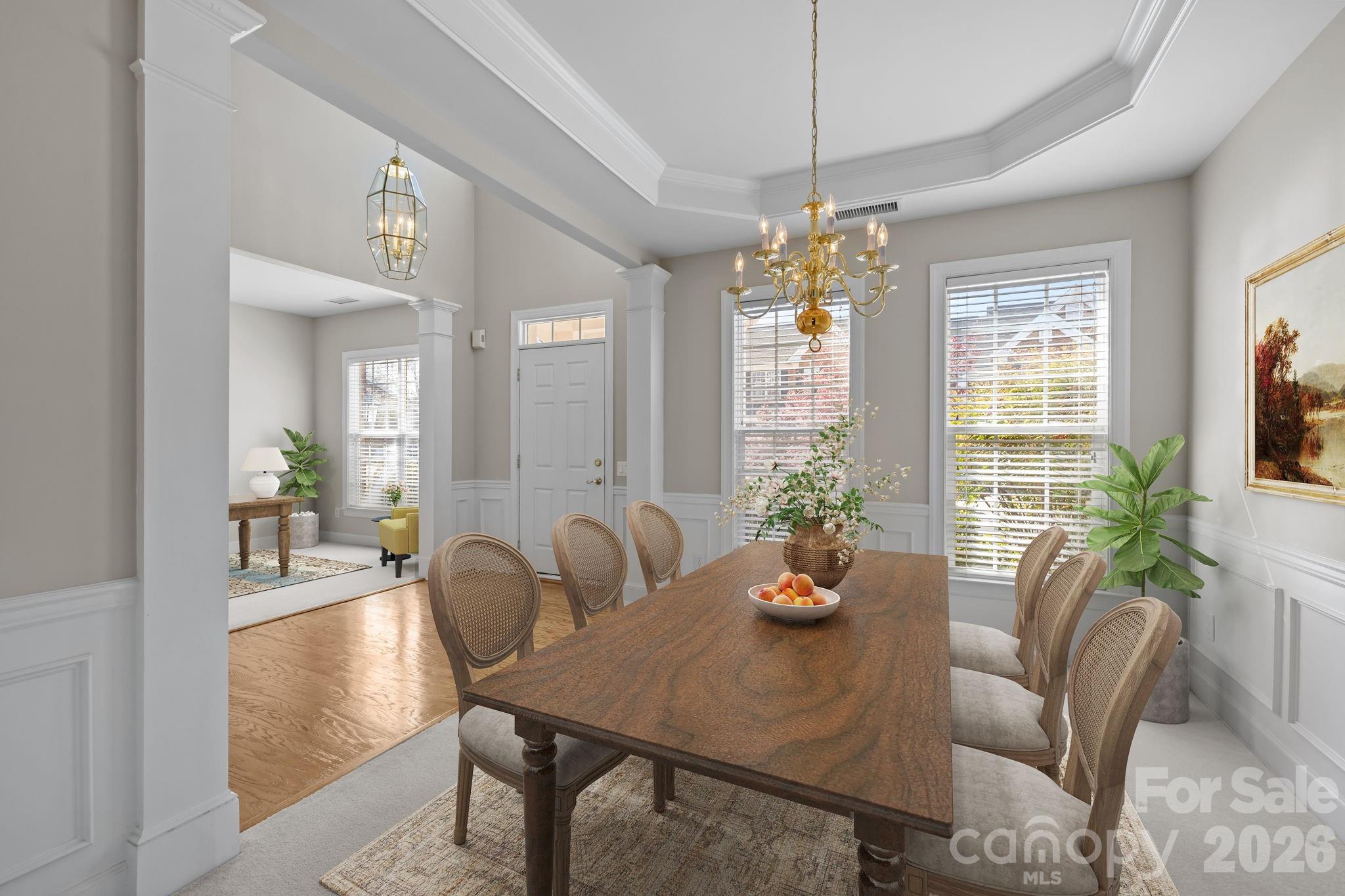 412 Eberle Way Matthews, NC 28105 - Photo 4 of 43 a living room with furniture or window and a chandelier
