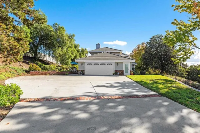 a dining room with furniture window and outside view