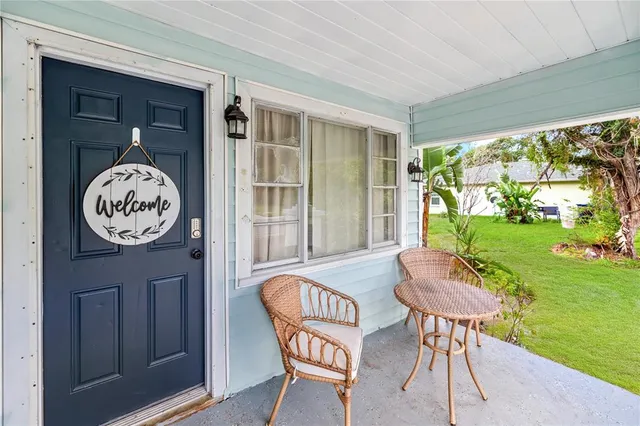 a view of a table and chairs in a room