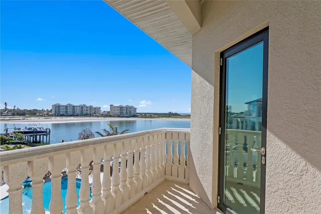 a view of a dining room with furniture chandelier and a chandelier