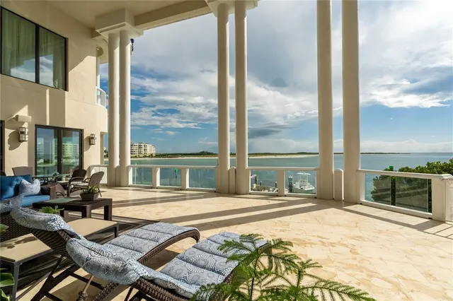 a view of a city with lawn chairs