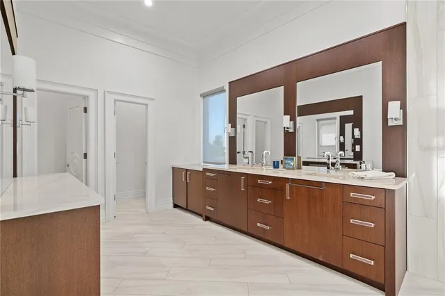 a view of a lake with houses in the back