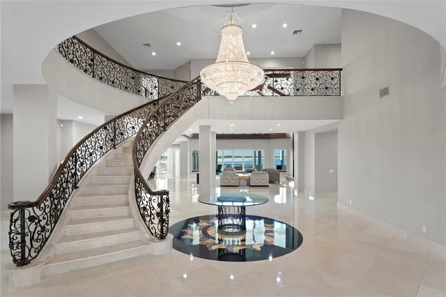 a bathroom with a tub shower and sink