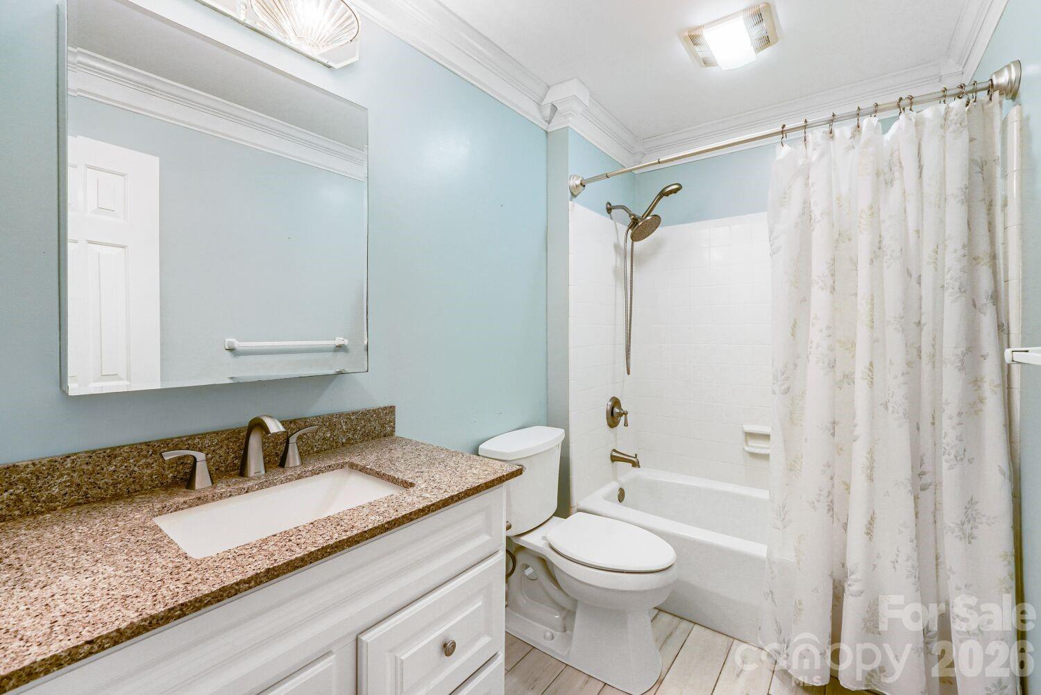 22527 John Gamble Road Cornelius, NC 28031 - Photo 15 of 33 a bathroom with a granite countertop sink toilet and shower