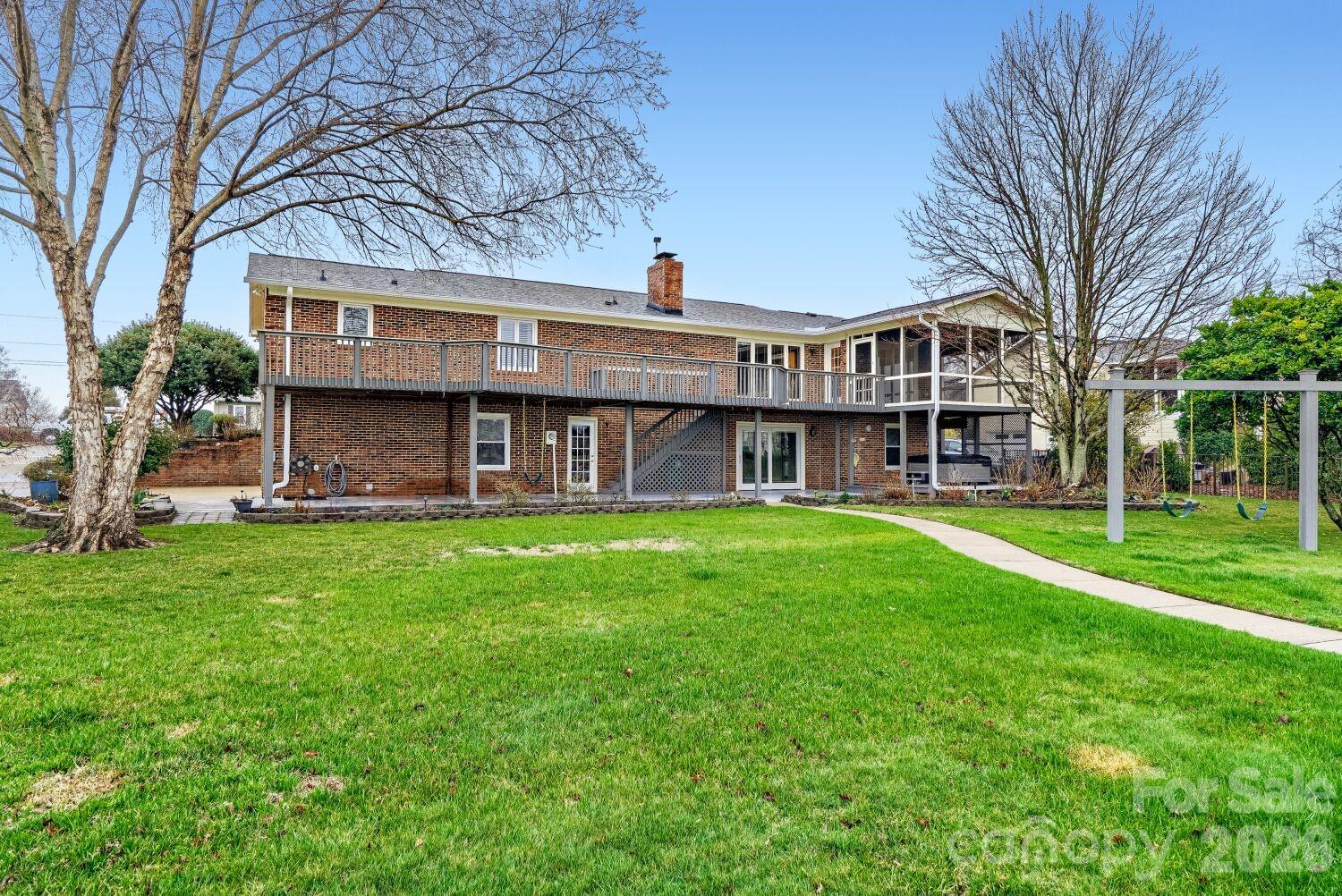 22527 John Gamble Road Cornelius, NC 28031 - Photo 27 of 33 a view of a house with a yard and plants
