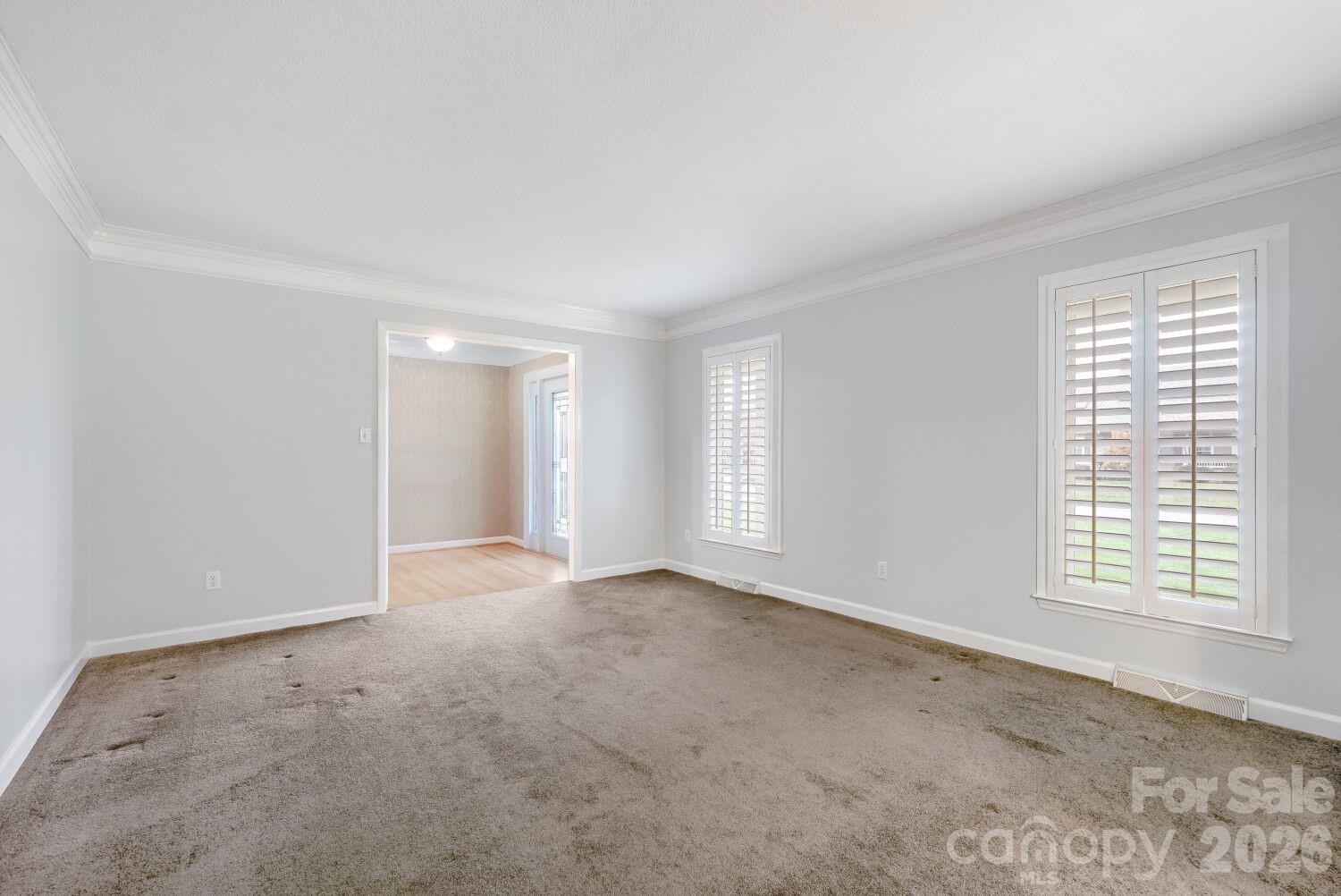 22527 John Gamble Road Cornelius, NC 28031 - Photo 6 of 33 an empty room with windows
