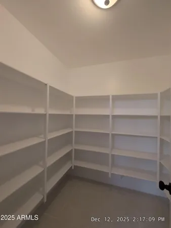 a view of a room with shelves