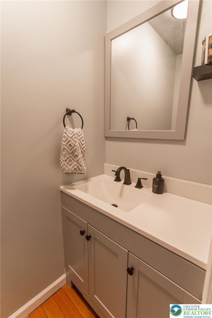 896 Briarstone Road Bethlehem, PA 18017 - Photo 10 of 26 a bathroom with a sink and a mirror