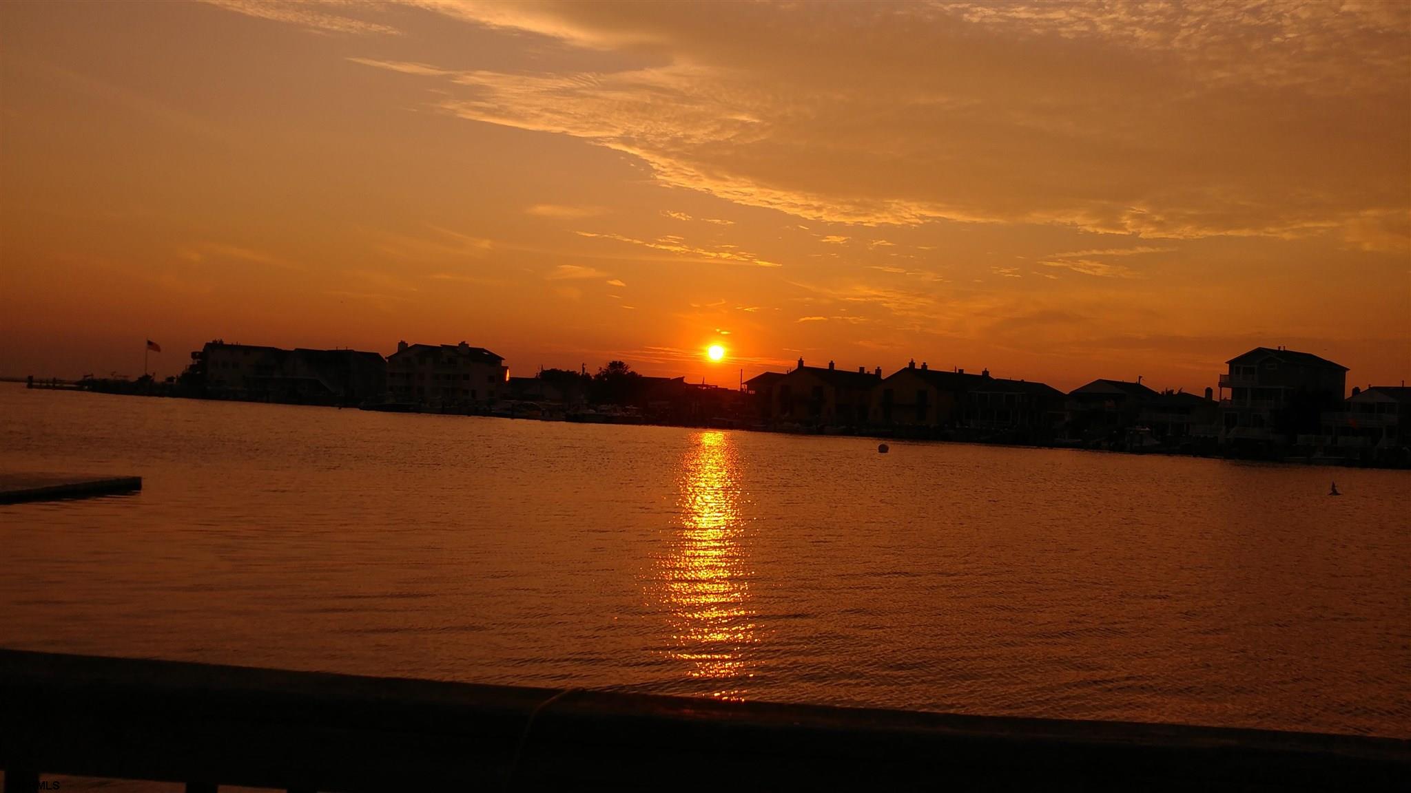 440 Hackney Place Brigantine, NJ 08203 - Photo 12 of 45 a view of lake and sunset