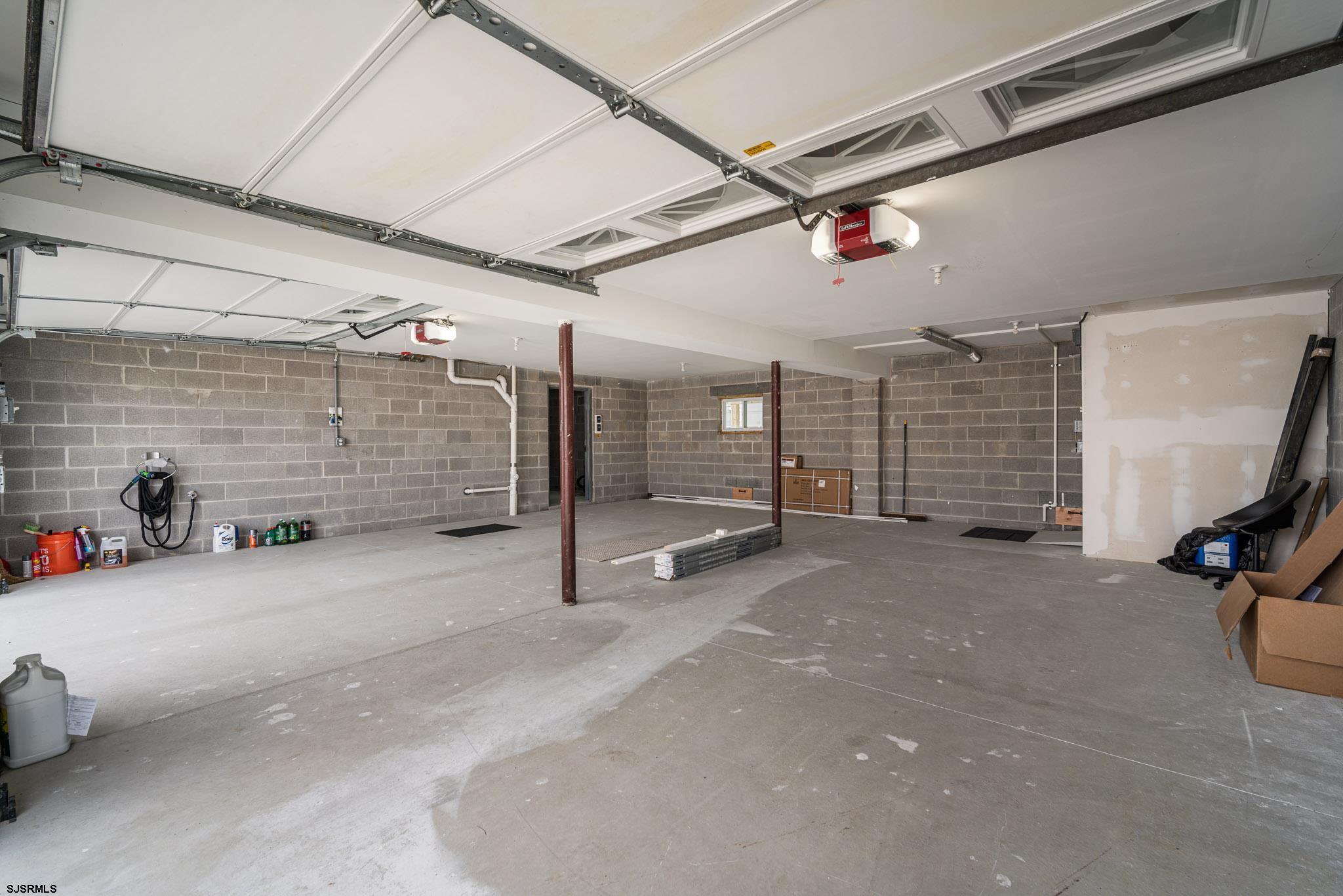 440 Hackney Place Brigantine, NJ 08203 - Photo 16 of 45 a view of a garage with storage