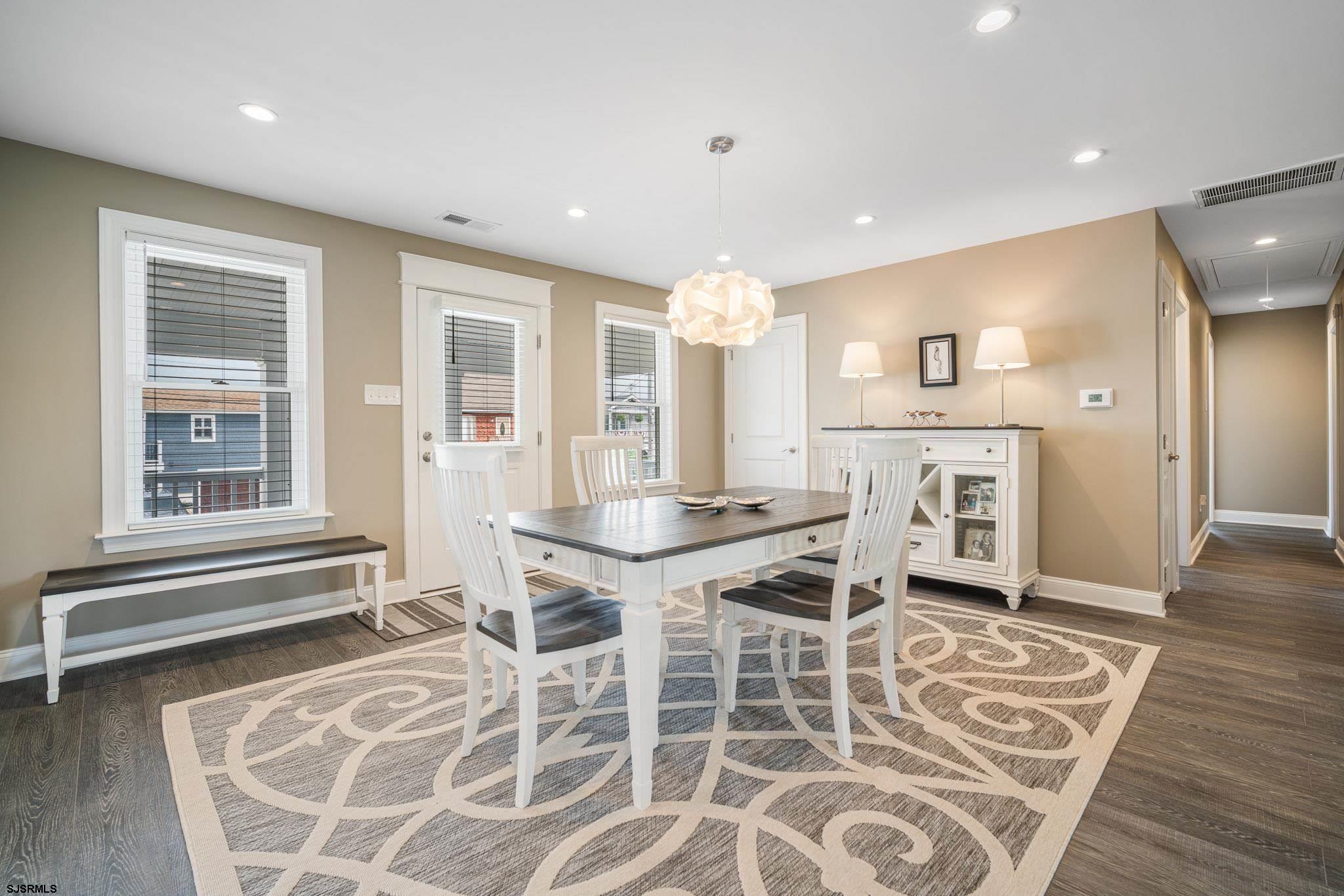 440 Hackney Place Brigantine, NJ 08203 - Photo 24 of 45 a view of a dining room with furniture and wooden floor