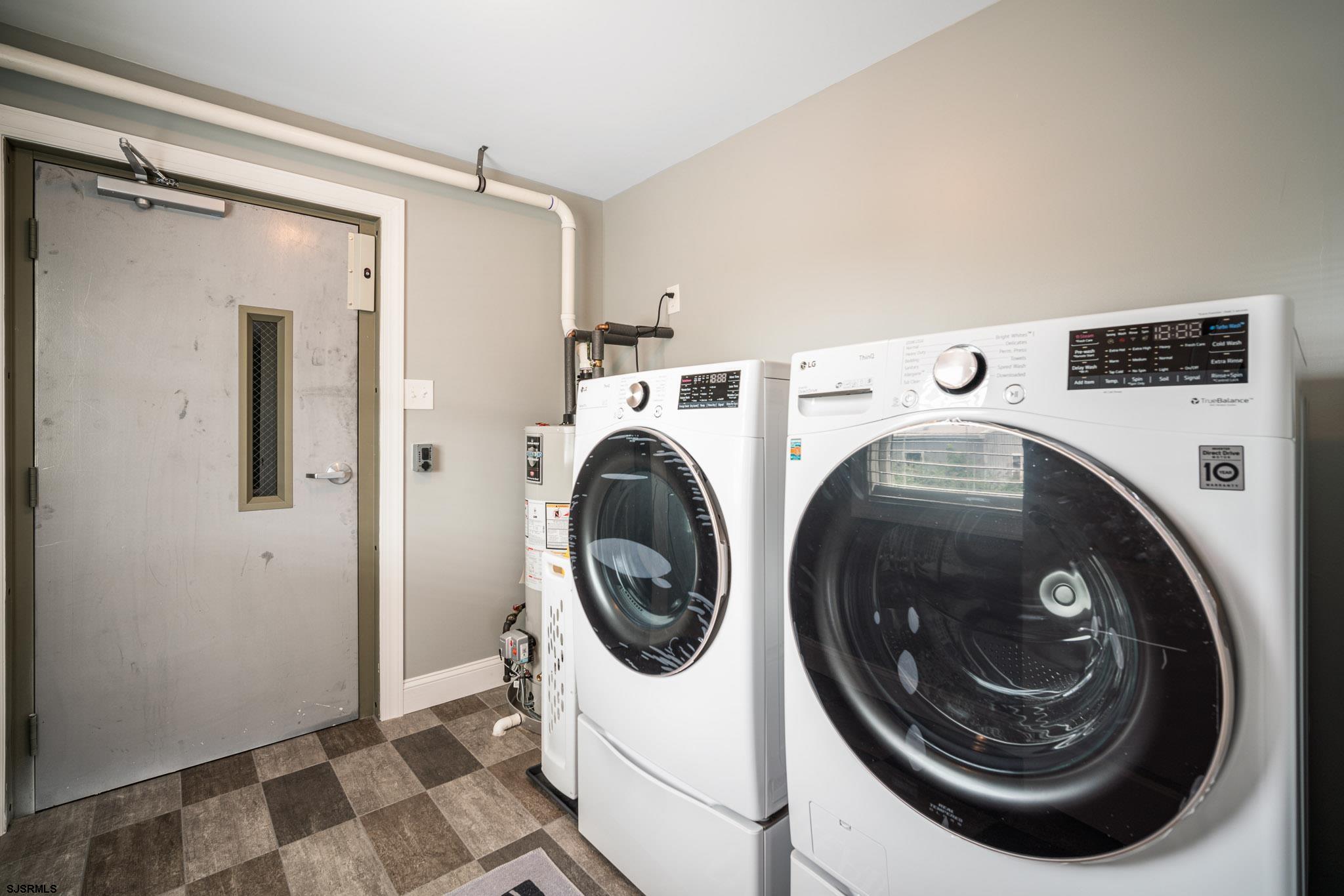 440 Hackney Place Brigantine, NJ 08203 - Photo 36 of 45 a utility room with dryer and washer