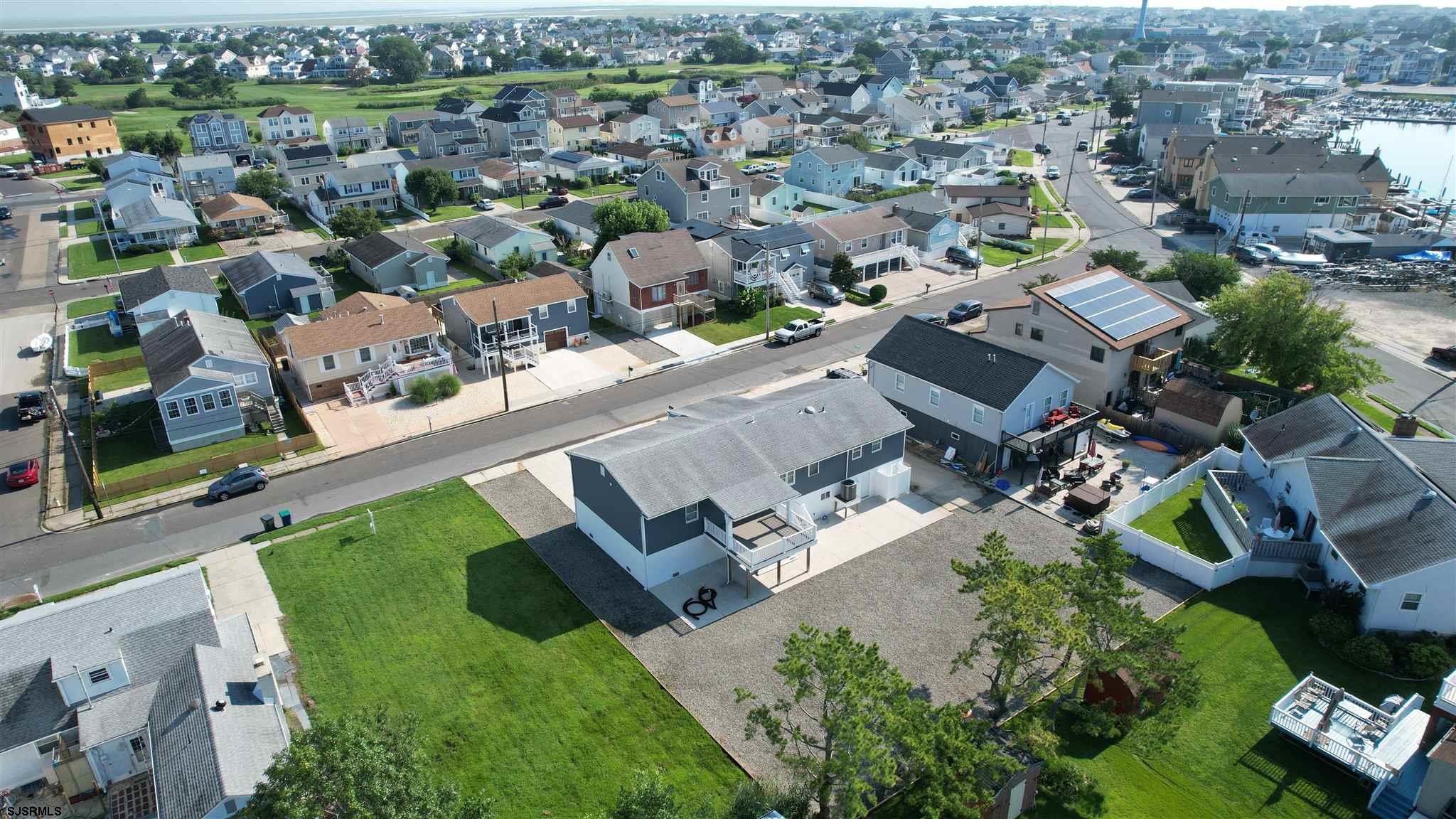 440 Hackney Place Brigantine, NJ 08203 - Photo 42 of 45 an aerial view of residential houses with outdoor space