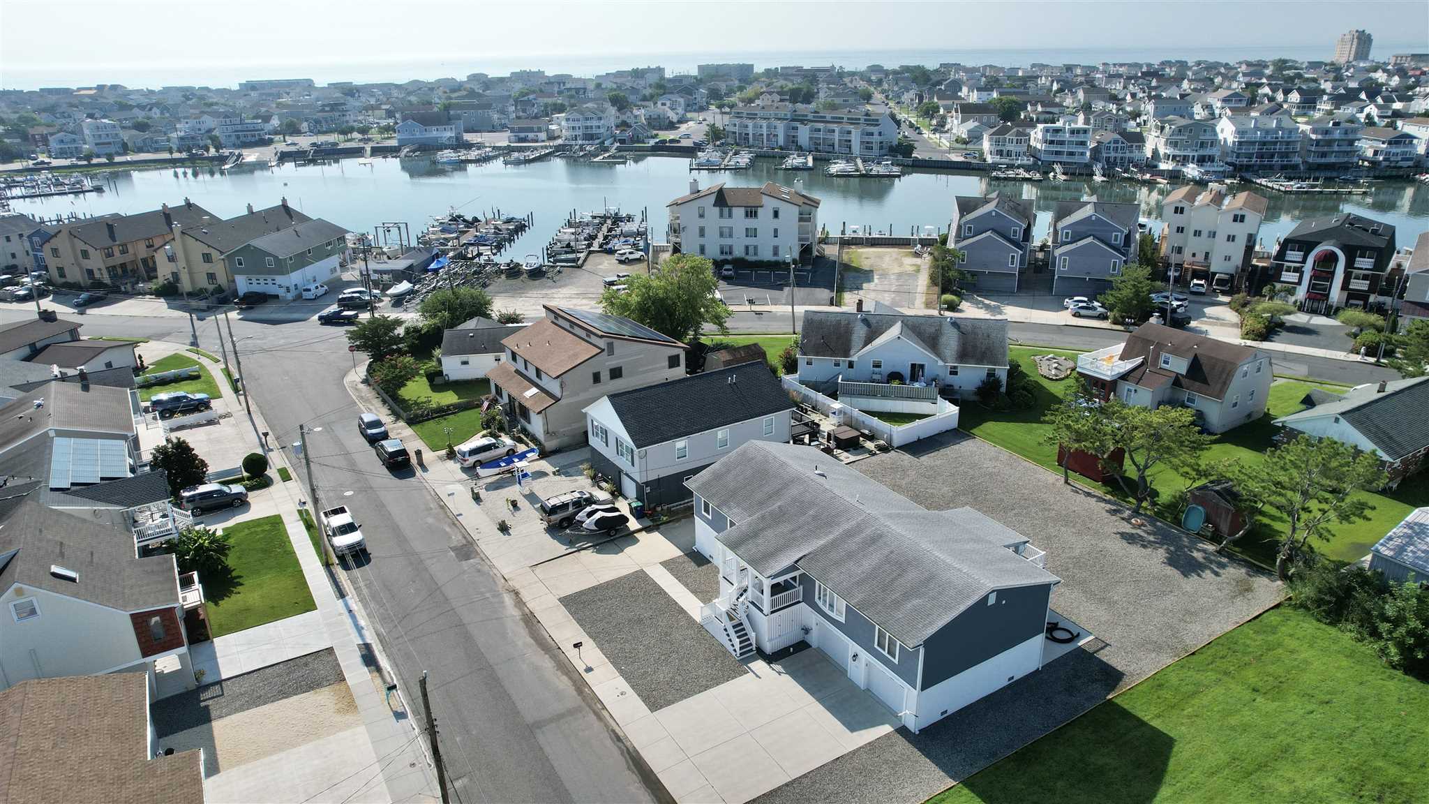 440 Hackney Place Brigantine, NJ 08203 - Photo 44 of 45 an aerial view of multiple houses with yard