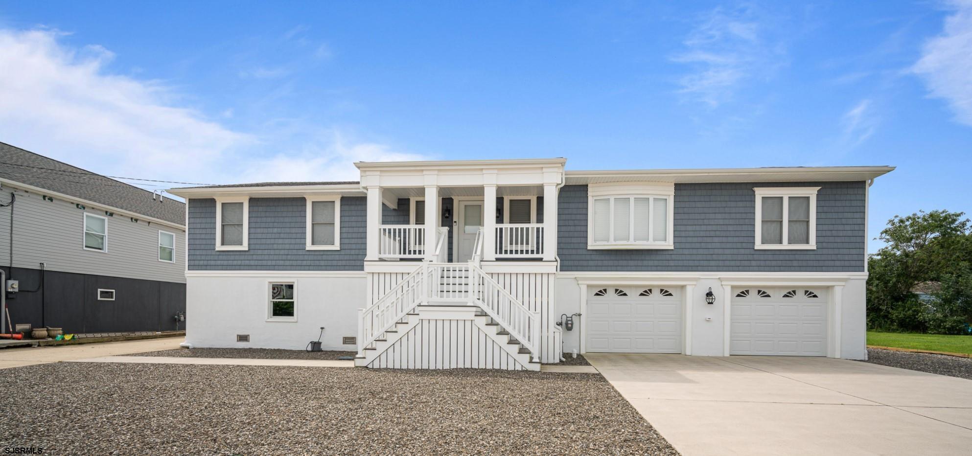440 Hackney Place Brigantine, NJ 08203 - Photo 6 of 45 a view of a house with windows