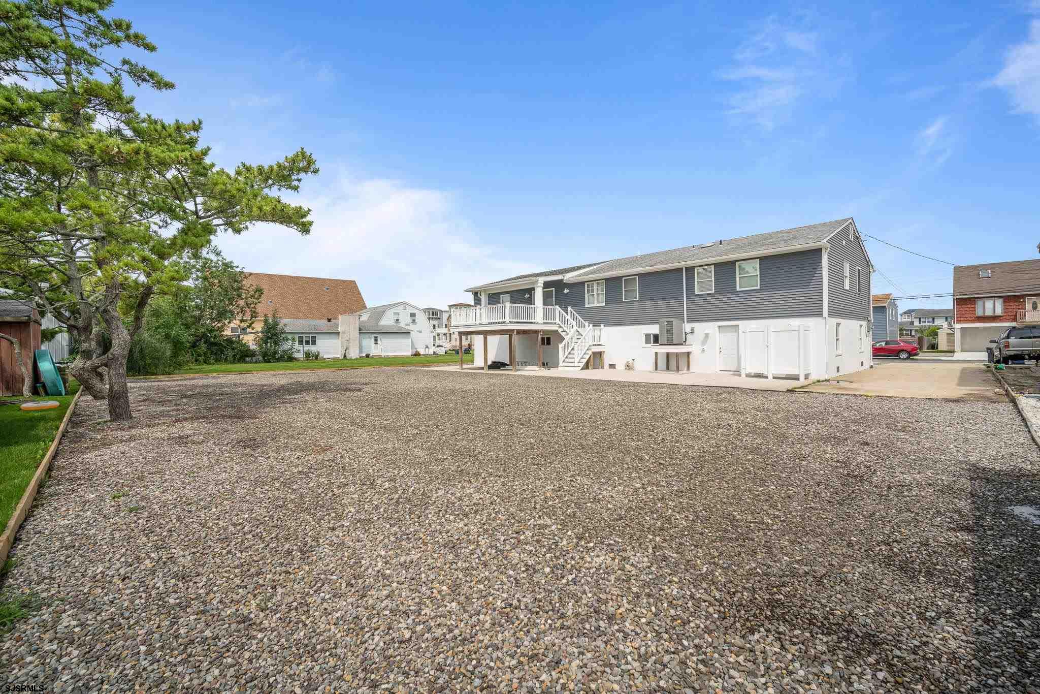 440 Hackney Place Brigantine, NJ 08203 - Photo 7 of 45 a view of house with outdoor space and sitting area