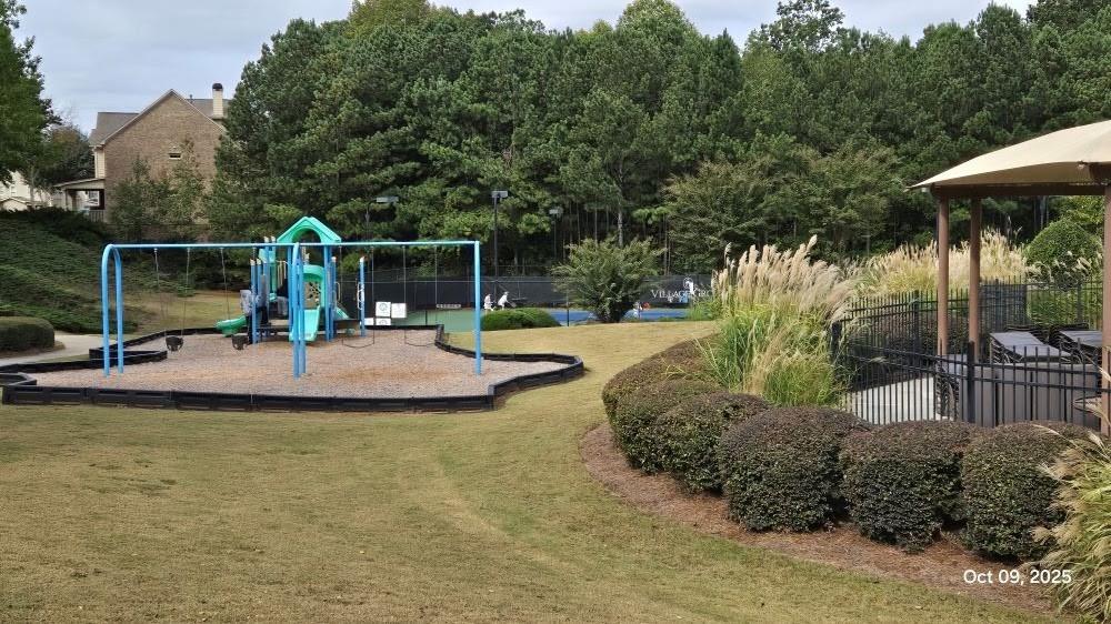 4363 Grove Field Park Northwest Suwanee, GA 30024 - Photo 18 of 18 a view of a park with slide