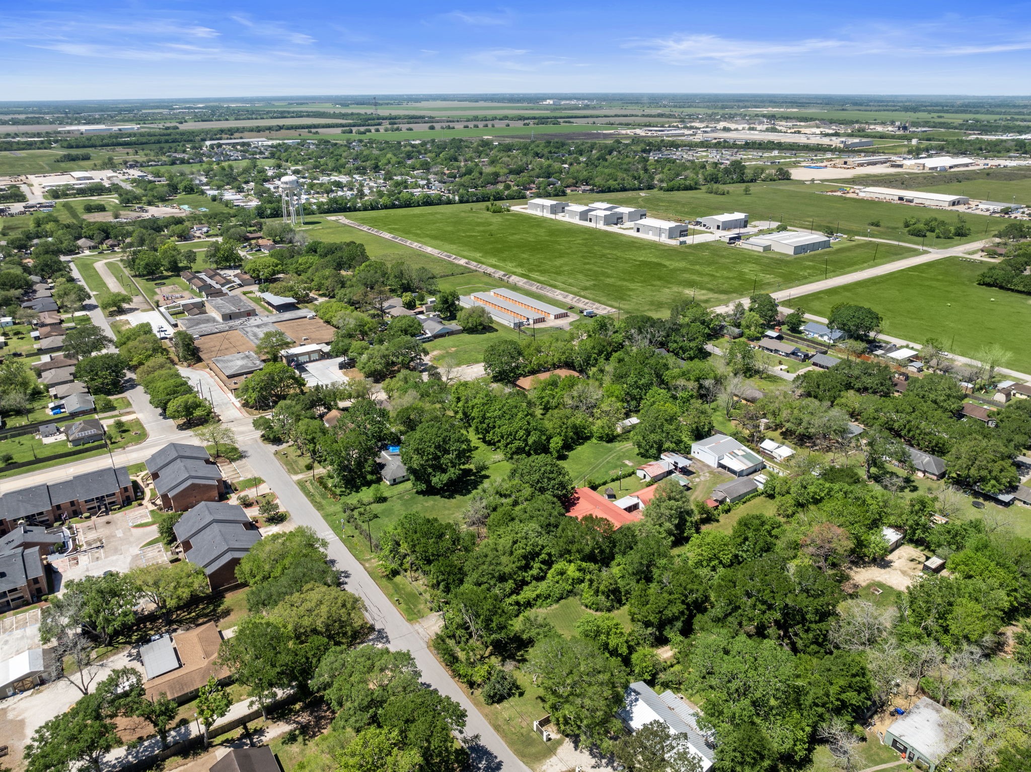 903 Brooks Avenue Rosenberg, TX 77471 - Photo 8 of 11 Just minutes from local schools and major roadways, this area combines established housing with open land—positioning it well for future investment or development.