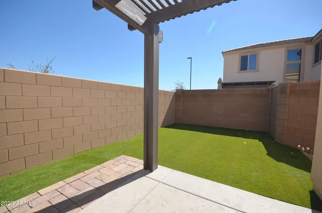 a view of a back yard of the house