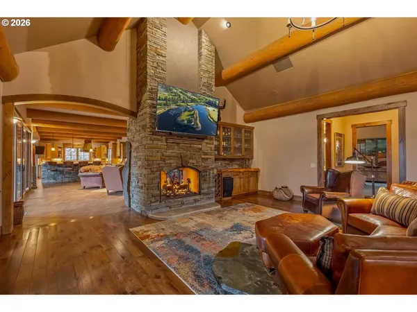 a bedroom with furniture and a fireplace