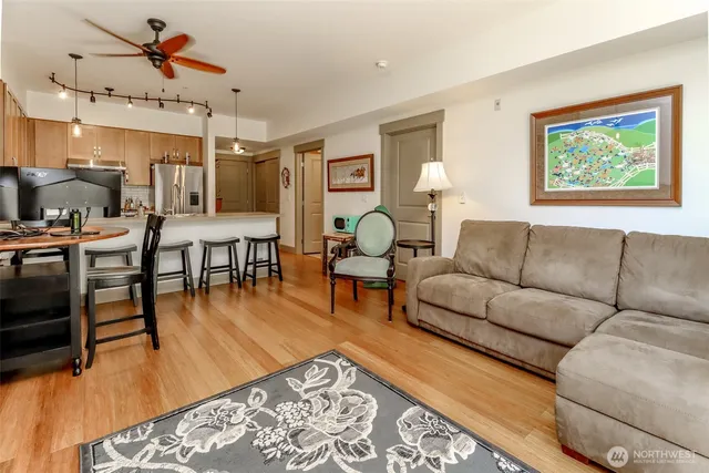 a bedroom with a bed and a flat tv screen