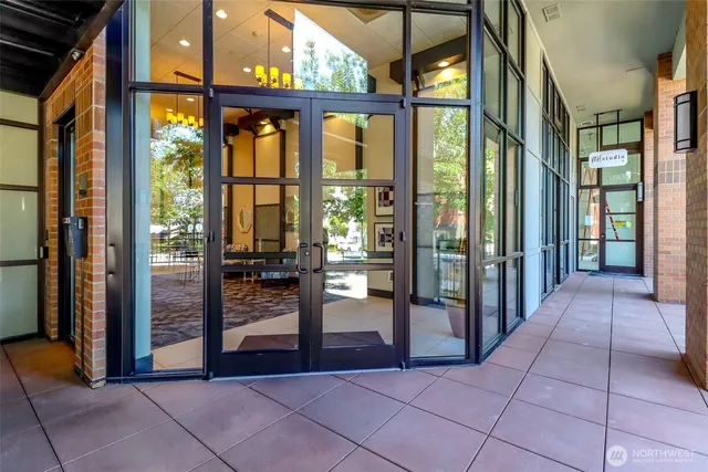 a very nice looking dining room with a chandelier