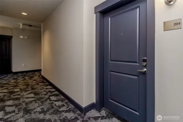 a view of outdoor space with wooden floor