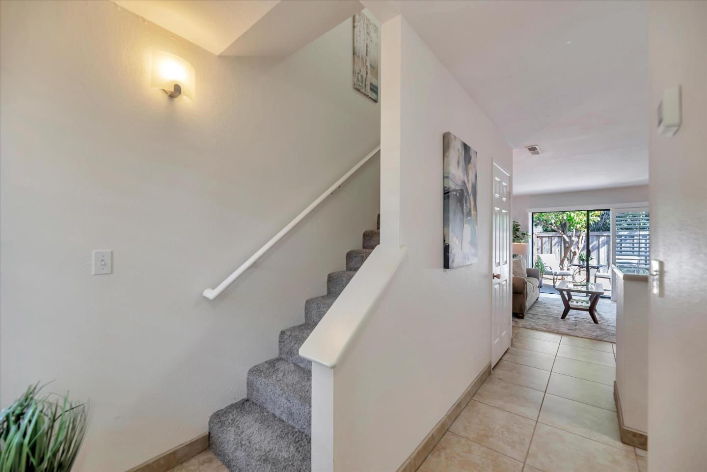 17075 Creekside Circle Morgan Hill, CA 95037 - Photo 11 of 49 a living room with furniture and a large window