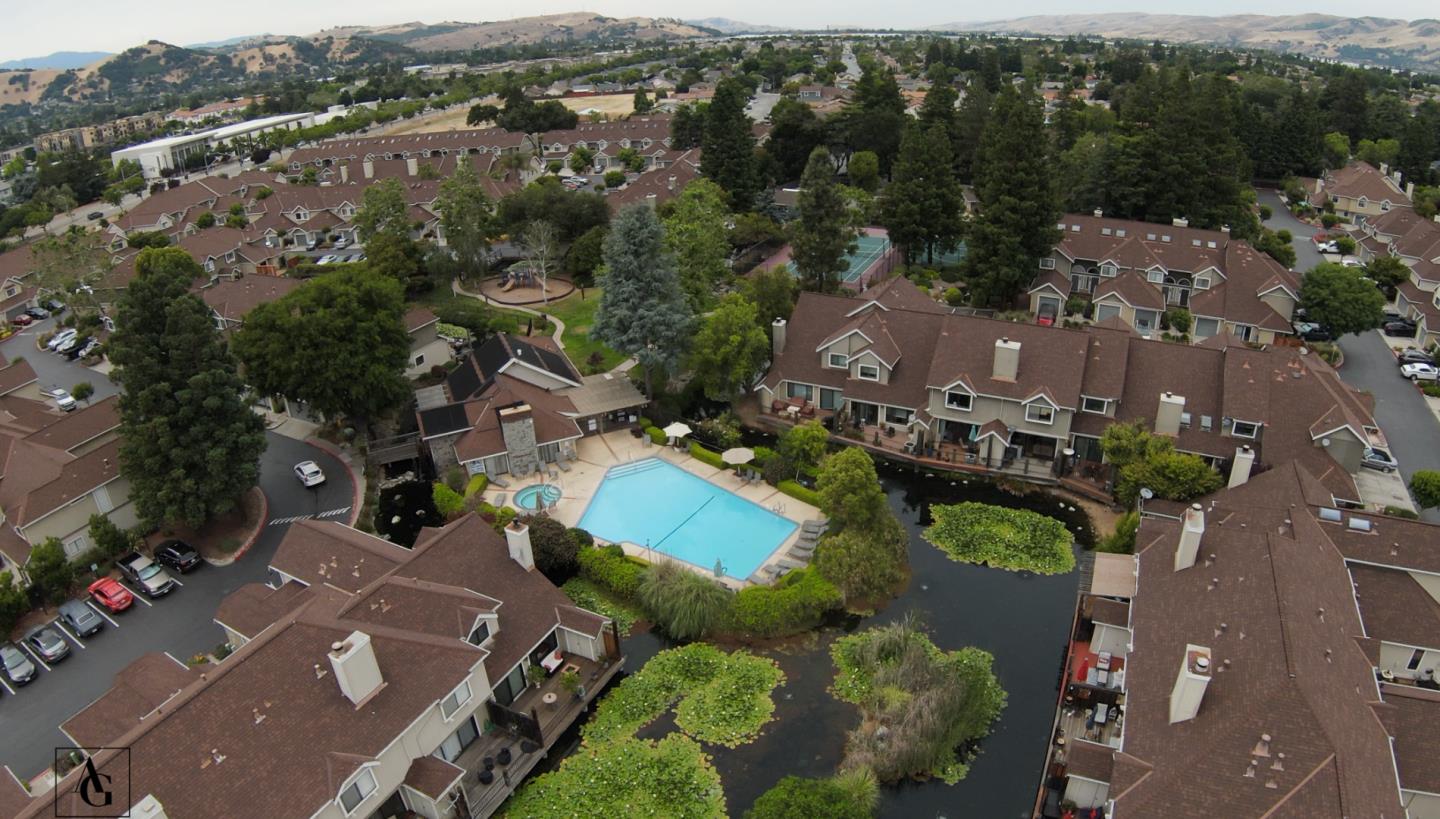 17075 Creekside Circle Morgan Hill, CA 95037 - Photo 14 of 49 an aerial view of multiple houses with yard