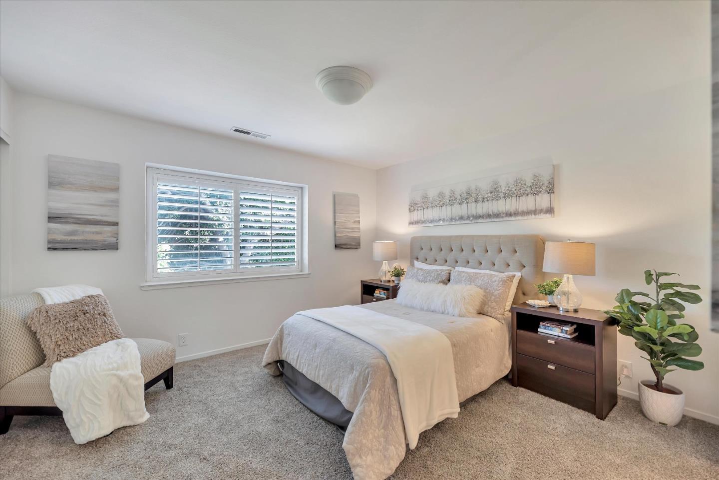 17075 Creekside Circle Morgan Hill, CA 95037 - Photo 15 of 49 a bedroom with a bed and a couch