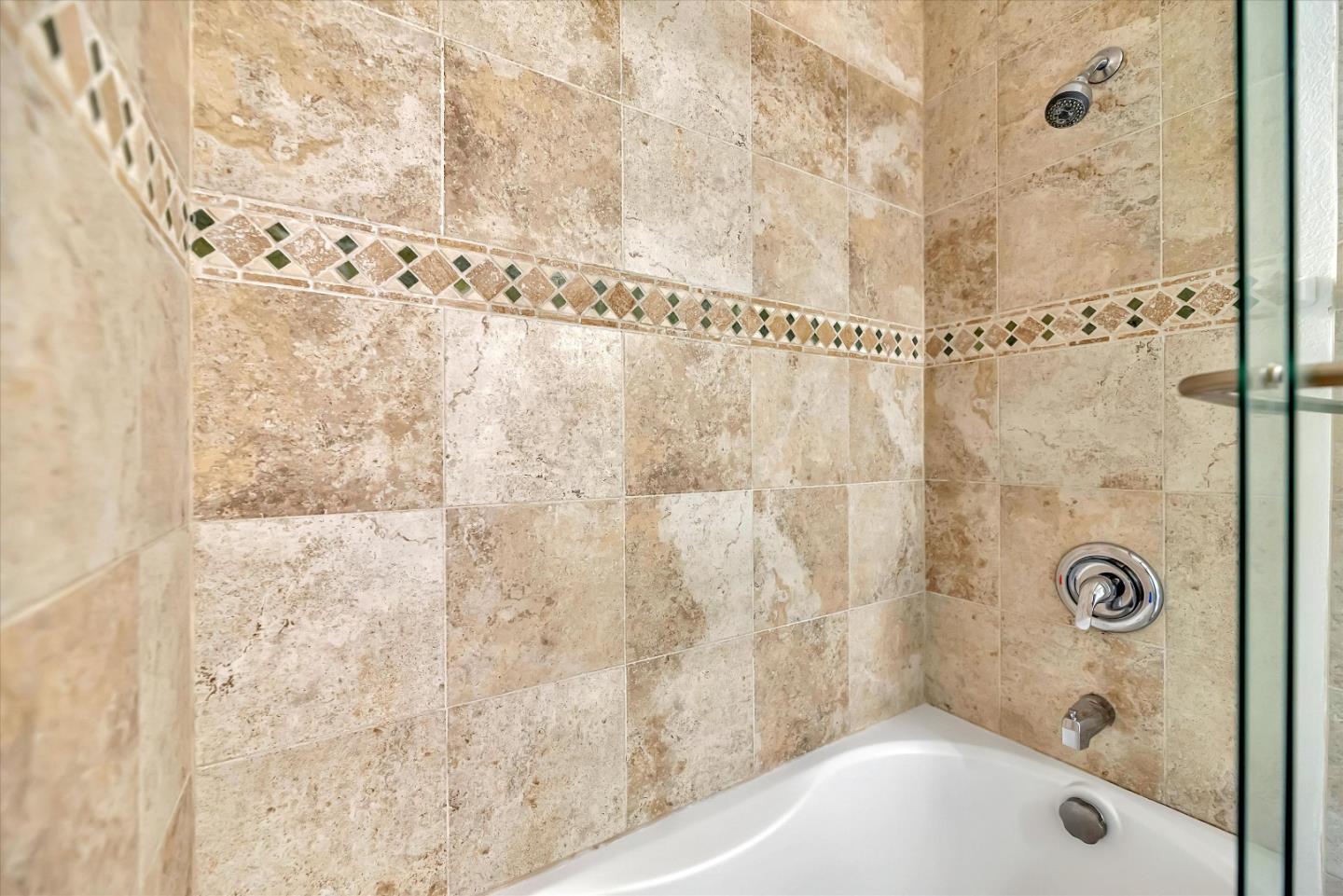 17075 Creekside Circle Morgan Hill, CA 95037 - Photo 28 of 49 a bathroom with a shower and a bathtub