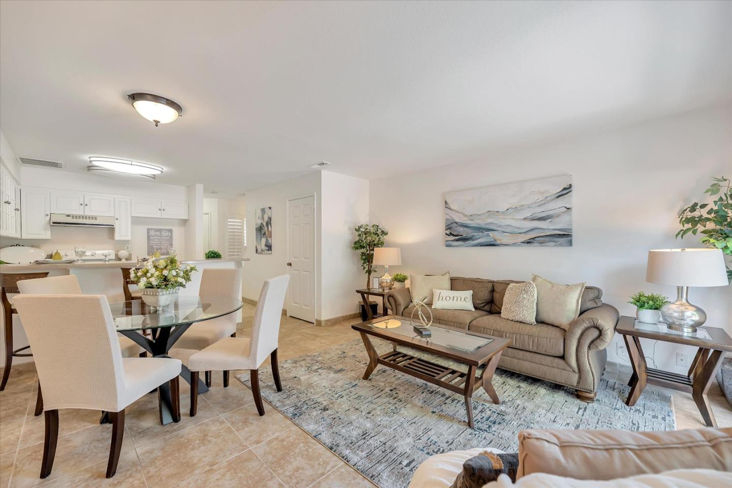 17075 Creekside Circle Morgan Hill, CA 95037 - Photo 6 of 49 a living room with furniture wooden floor and a table