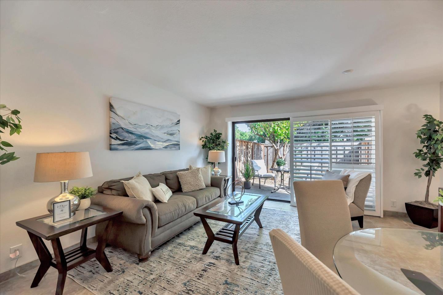 17075 Creekside Circle Morgan Hill, CA 95037 - Photo 8 of 49 a living room with furniture and a large window