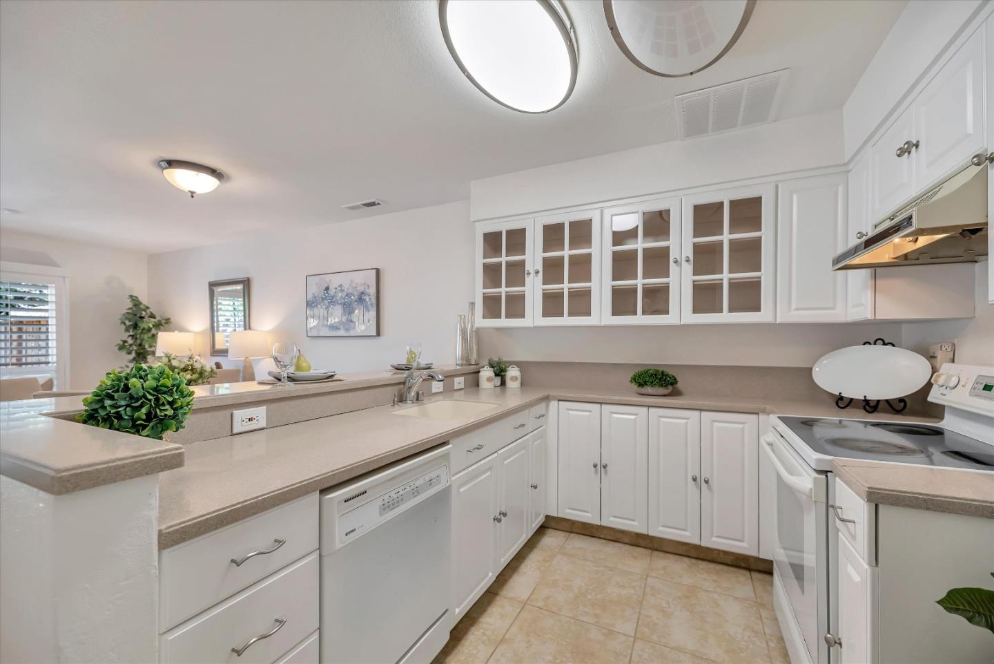 17075 Creekside Circle Morgan Hill, CA 95037 - Photo 9 of 49 a kitchen with a sink and cabinets