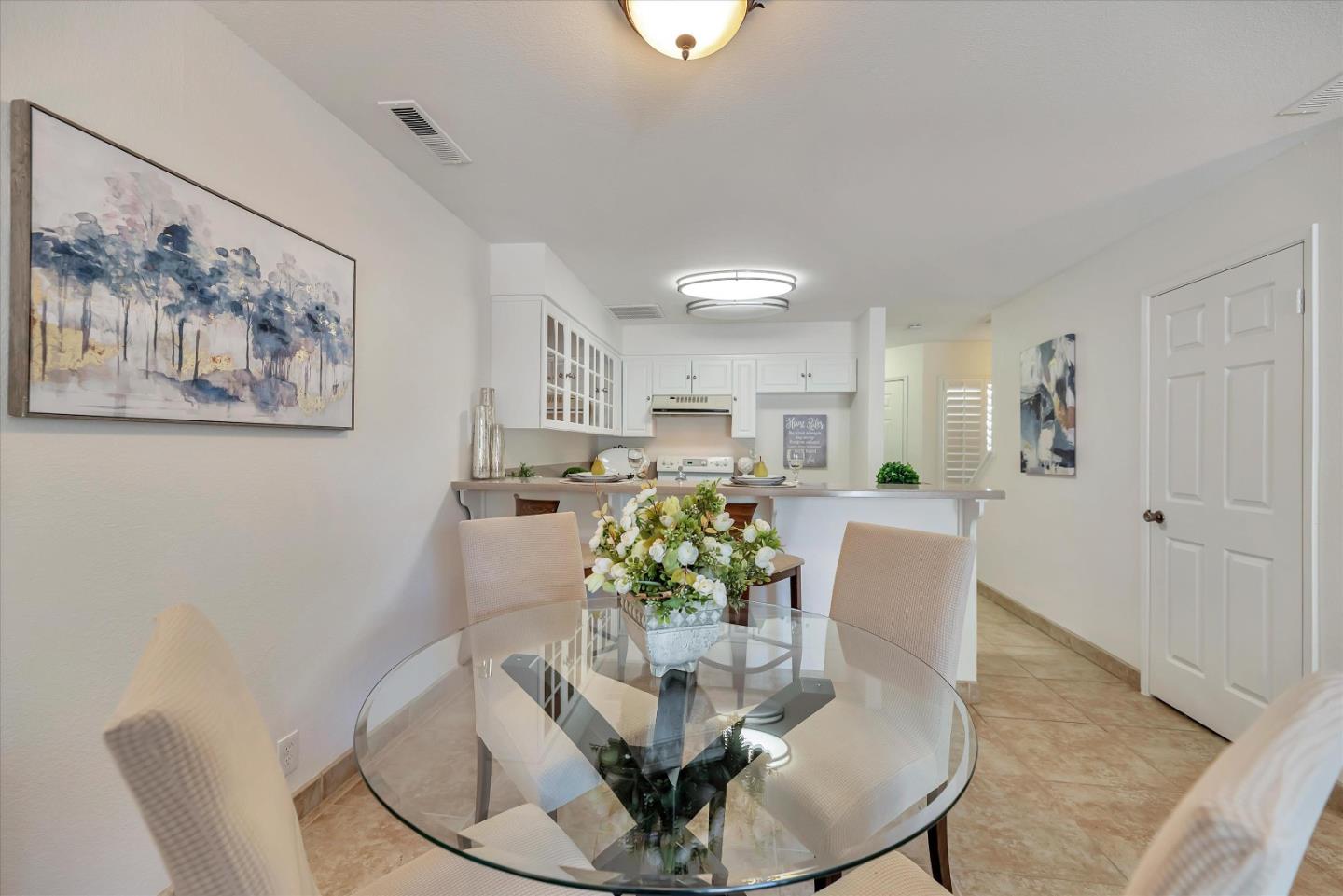 17075 Creekside Circle Morgan Hill, CA 95037 - Photo 10 of 49 a dining room with furniture and wooden floor