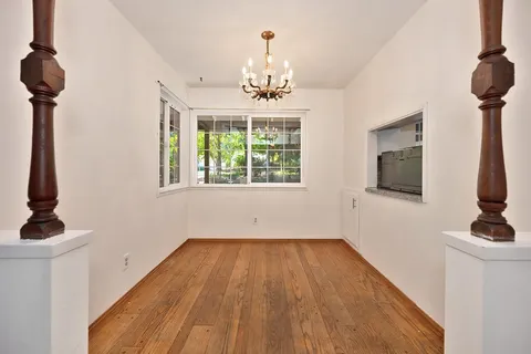 a kitchen with a sink stove and refrigerator