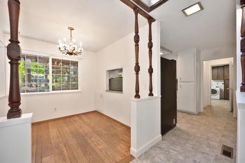 a kitchen with a sink stove and microwave