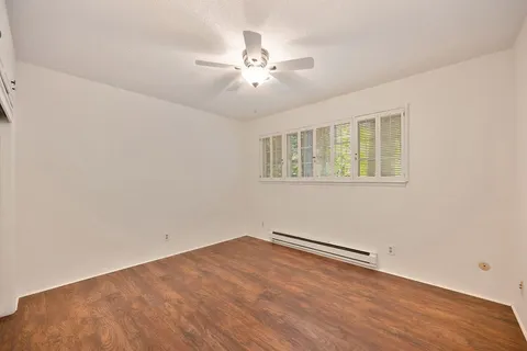 a view of a livingroom with furniture