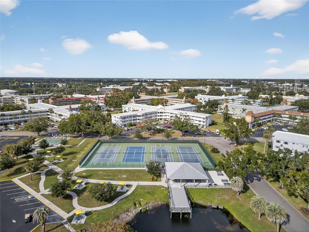 2292 Austrian Lane, Unit 26 Clearwater, FL 33763 - Photo 26 of 27 an aerial view of residential houses with outdoor space